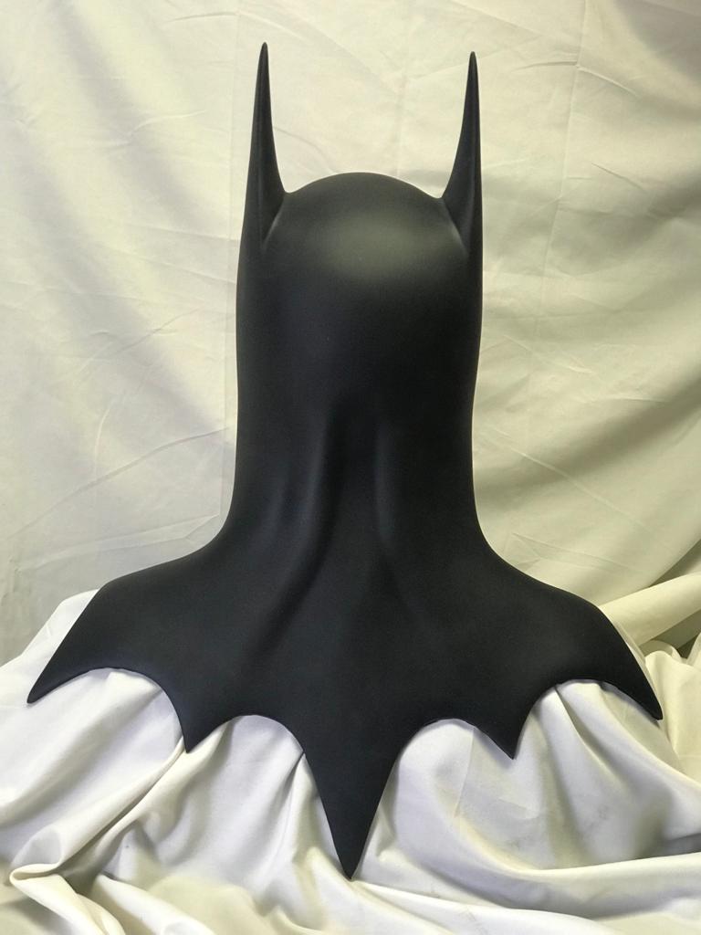 Returns cowl and emblem